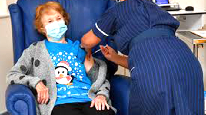 Covid vaccine: UK woman becomes first in world to receive Pfizer jab