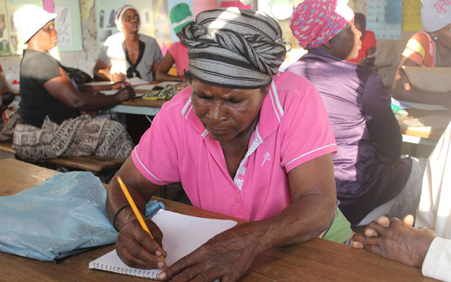 soldiering on . . . Mbuya Tsatsawani (69) in class