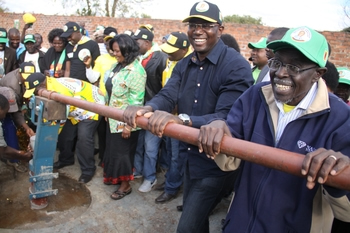 Zanu-PF chairman for Harare province Ambassador Amos Midzi (right) and the party’s losing candidate for Warren Park Cde Abicia Ushewokunze unveil a borehole at St Francis Flats in Belvedere, Harare yesterday
