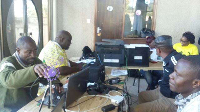 Zanu-PF accreditation officers grant attendance credentials to members of the Youth League Wednesday morning ahead of the Million-Man March to be held in Harare today. - Pic by Nyemudzai Kakore