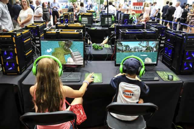 Children play in a Minecraft tournament during Ascot Dubai Duty Free Shergar Cup recently in Ascot, England