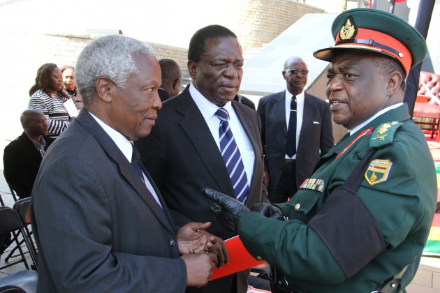 Minister of Justice, Legal and Parliamentary Affairs Emmerson Mnangagwa, Minister of Defence Sydney Sekeramayi chat to Commander Zimbabwe Defence Forces Constantine Chiwenga (Picture by Kudakwashe Hunda)