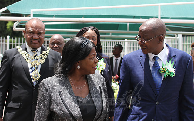 Minister of Justice, Legal and Parliamentary Affairs Ziyambi Ziyambi (R) chats with Senate President Edna Madzongwe. Picture by Wilson Kakurira