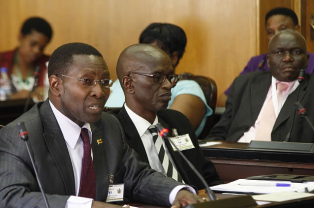 Mr Magosvongwe (left) flanked by director of Indigenisation in the Ministry, Mr Godfrey Sigobodhla.