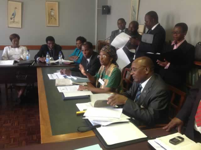 Sport, Arts and Culture permanent secretary Dr Thokozile Chitepo (centre) flanked by Sports and Recreation Commission Vice Chairperson Mr Edward Siwela (left) and Director of Finance, Administration and Human Resources in her ministry, Mr Philip Hamadziripi and officials behind give oral evidence before the Committee yesterday (pic by Lloyd Gumbo)
