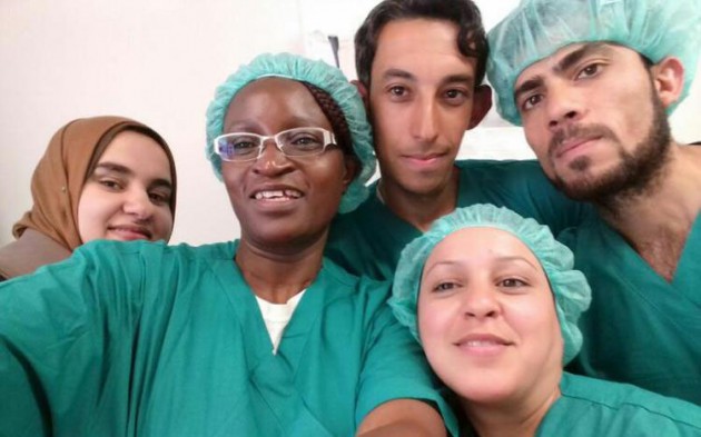 Mrs Jairos poses with some of  the medical staff during her Iraq tour.
