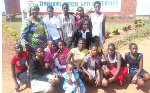 AU ambassador for ending child marriages, Ms Nyaradzayi Gumbonzvanda and Tendai Magwaza (in white blouse) pose with some of the girls from the Rozaria Memorial Trust after the public lecture on child marriages in Bindura recently