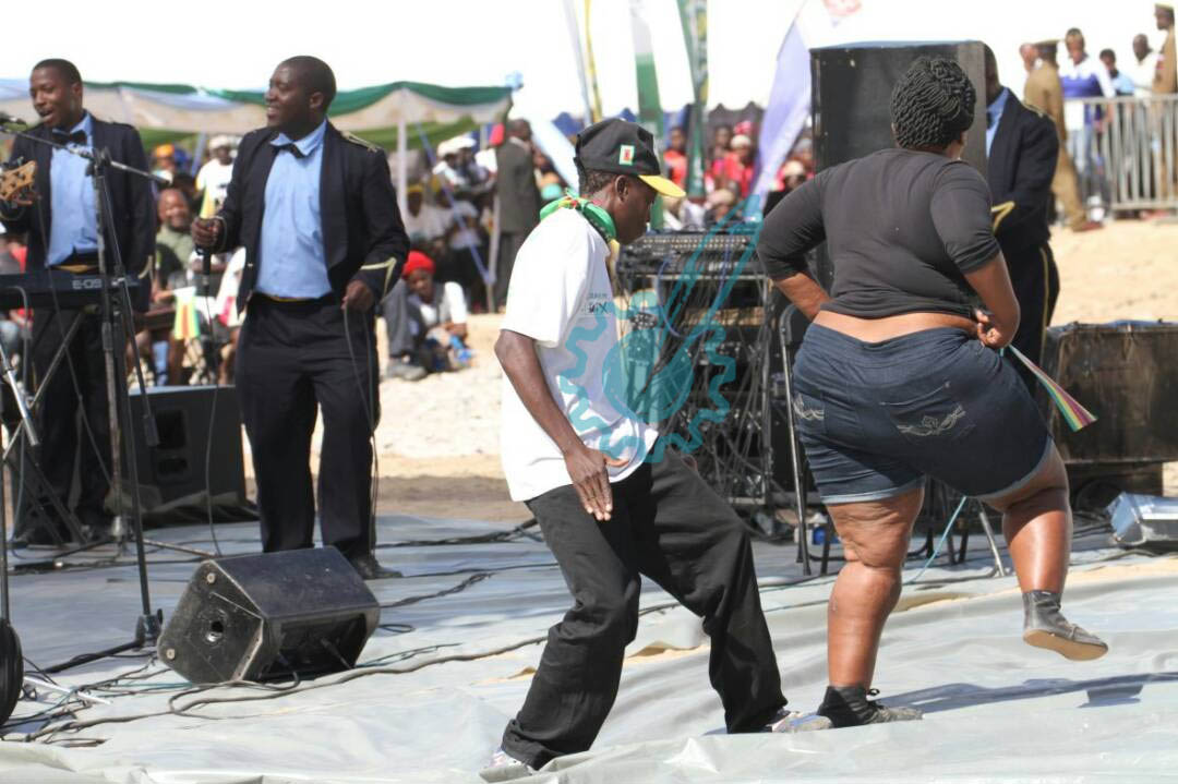 Members of the public dance to music by Zimbabwe Republic Police band entertaining guests earlier on.
