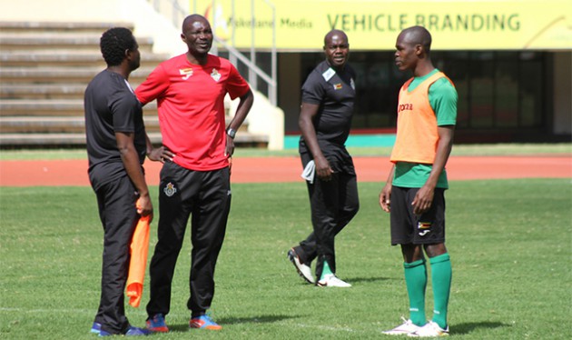 STRATEGIC MEETING . . . Warriors coach Callisto Pasuwa (second from left) and his assistant Mkhuphali Masuku discuss strategies with their talismanic forward Knowledge Musona during the senior national team’s training session at the National Sports Stadium yesterday. — Picture by Kudakwashe Hunda