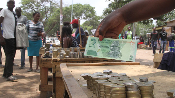 Cash withdrawals begin amid huge demand