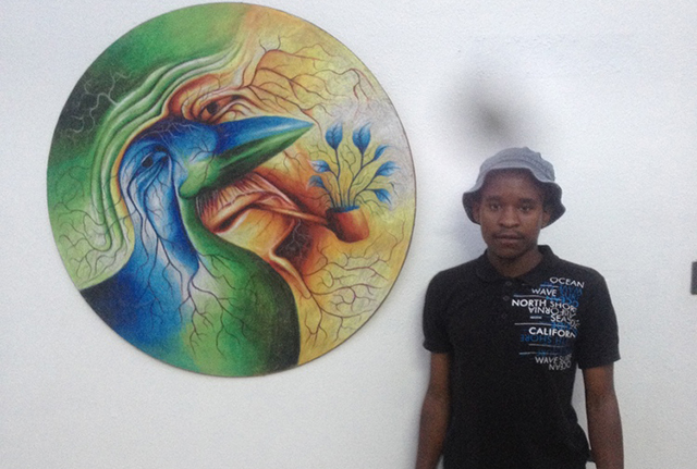 Thabani Ngandula and one of his paintings