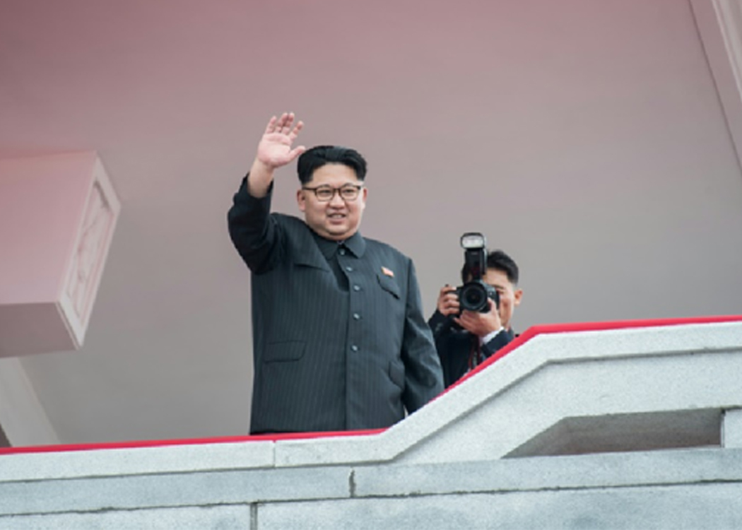 North Korean leader Kim Jong-Un waves after a 2016 rally
