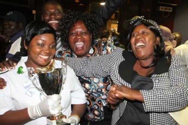 ALL SMILES . . . Tariro Vunganai being congratulated by her mother Anna (right) and her friend Thandiwe Mathle after emerging the best theatre student nurse at Parirenyatwa Hospital yesterday