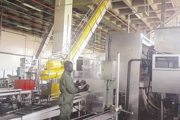An olivine employee monitors the production line at the company's plant. Wilmar International is set to acquire a 50,69 percent stake in the company