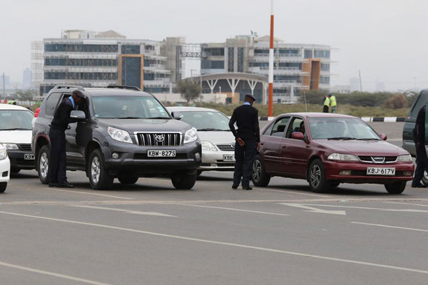 Police check vehicles at a security check point at Jomo Kenyatta airport in Nairobi today ahead of US President Barack Obama arrival - Daily Nation