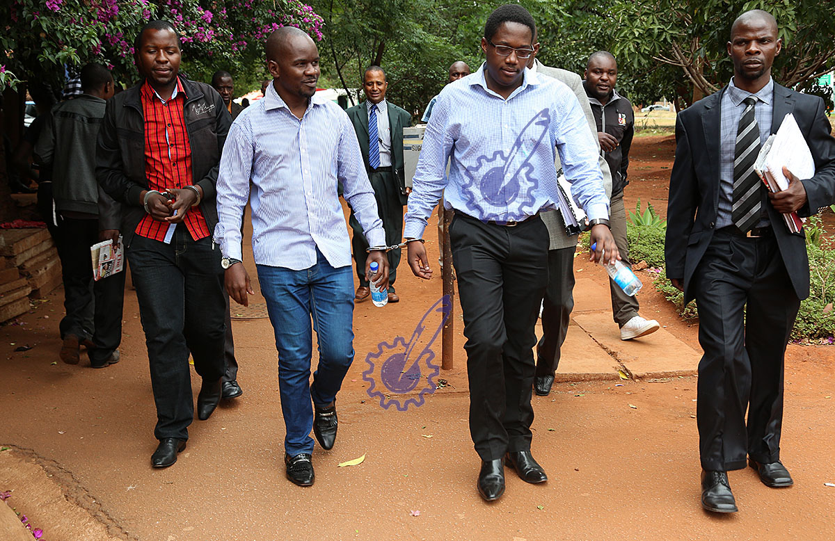 Sunday Mail Editor Mabasa Sasa, Investigations Editor Brian Chitemba and Reporter Tinashe Farawo on the way to court