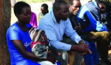 Oprah Nyagadza, her father (centre) and Takudzwa Katerere