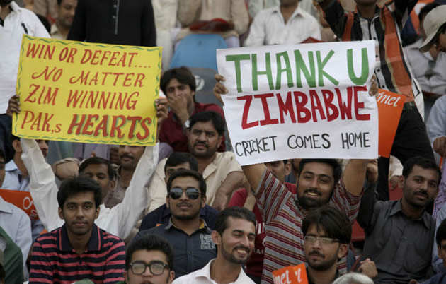A SHOW OF APPRECIATION . . . Pakistan fans thank the Zimbabweans for being brave enough to tour their country in May. - AFP