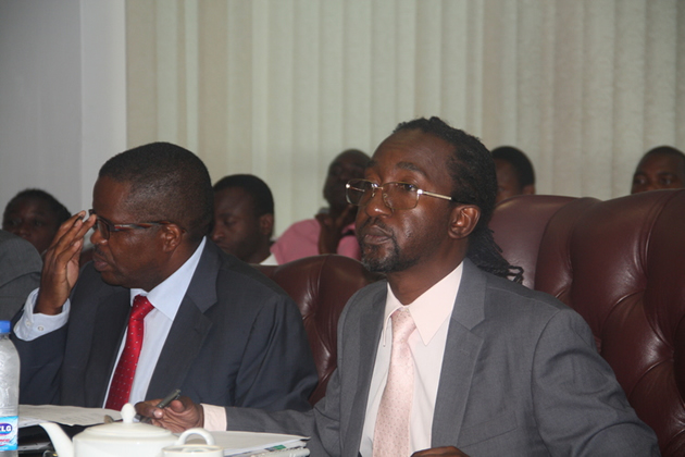 Youth, Indigenisation and Economic Empowerment Minister Patrick Zhuwao (right) stresses a point during a Line Ministries Seminar held in Harare on Wednesday while National Indigenisation and Economic Empowerment Board chief executive Mr Wilson Gwatiringa (left) follows proceedings. — (Picture by Shelton Muchena)
