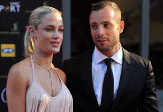 IN HAPPIER TIMES . . . Oscar Pistorius and Reeva Steenkamp