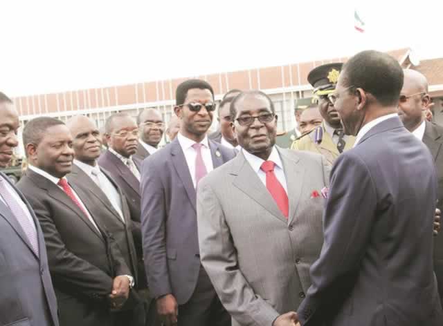 President Mugabe bids farewell to his Equatorial Guinea counterpart President Teodoro Obiang Nguema Mbasogo at Harare International Airport yesterday. Mr Nguema was in Harare on a three-day working visit. — (Picture by John Manzongo)