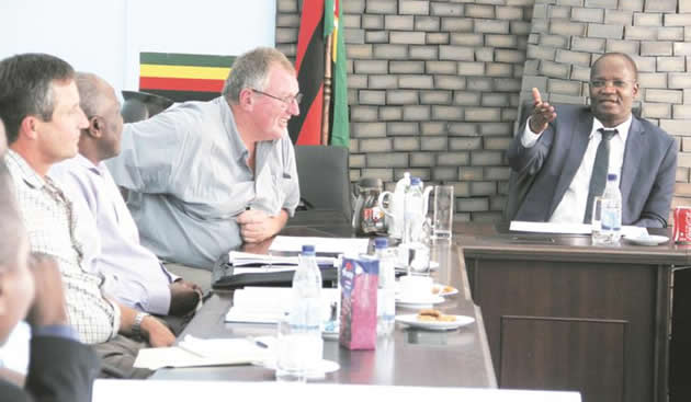 Minister queries stadium cost