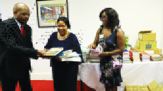 Firm backs First Lady’s education drive. . . donates books worth US$50 000 to Angel of Hope