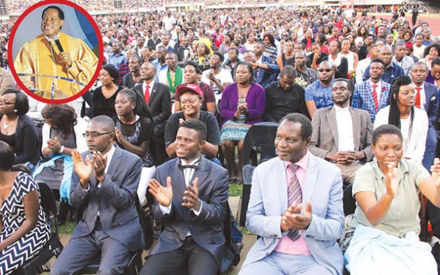Part of the crowd  that attended Nigerian Pastor Chris Oyakhilome’s (inset) Worship and Communion service at the National Sports Stadium yesterday. — Picture by Innocent Makawa