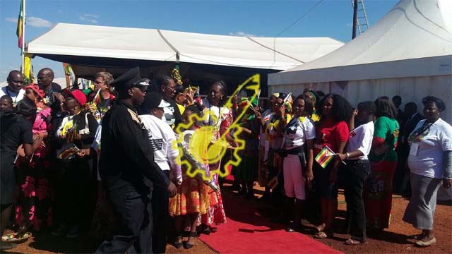 Preparing for President Mugabe's grand entry into the venue . . .