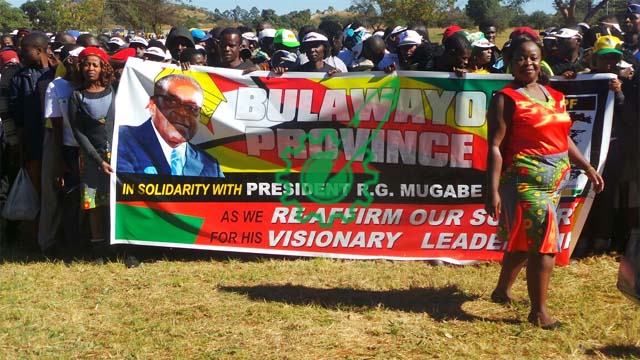 Colourful . . .Part of the members of Bulawayo Province read to march in honour of President Mugabe. - Believe Nyajudjara.