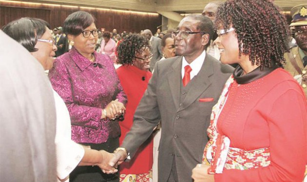 President Mugabe and First Lady Amai Grace Mugabe greet zanu-pf Central Committee members Eunice Sandi Moyo (left) and Oppah Muchinguri-Kashiri before the Central Committee meeting in Harare yesterday. — (Picture by Justin Mutenda)