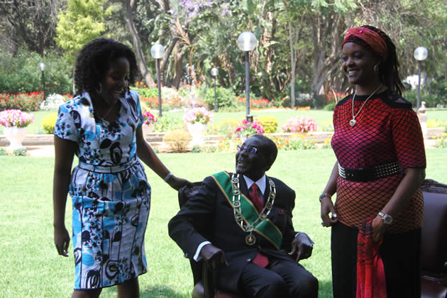 President Mugabe, First Lady Amai Grace Mugabe and their daughter Bona at State house before the opening parliament