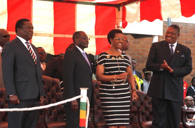 President Mugabe and First Lady Amai Grace Mugabe flanked by Vice Presidents Mnangagwa and Mphoko at Hre International Airport today.