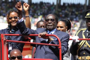President Mugabe arrives for the Inauguration accompanied by First Lady Amai Grace Mugabe.