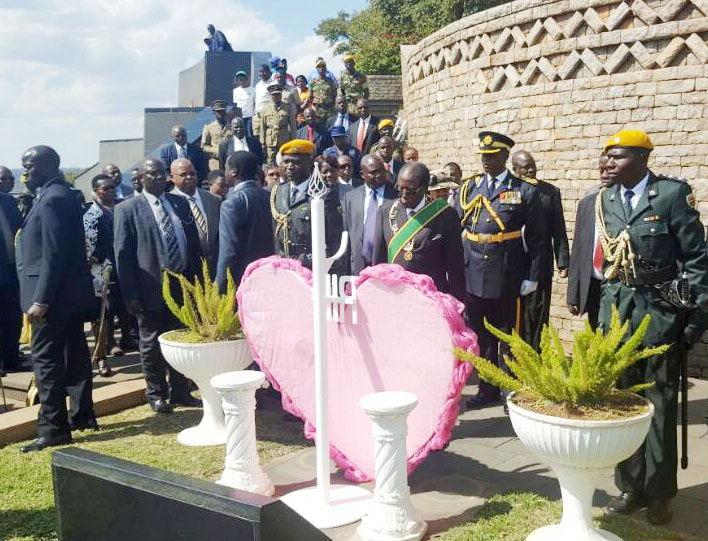 President Mugabe at the grave of his late wife Cde, Sally Mugabe