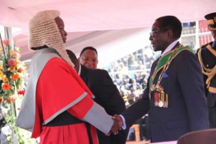 President Mugabe is congratulated by Chief Justice Godfrey Chidyausiku after the swearing in ceremony
