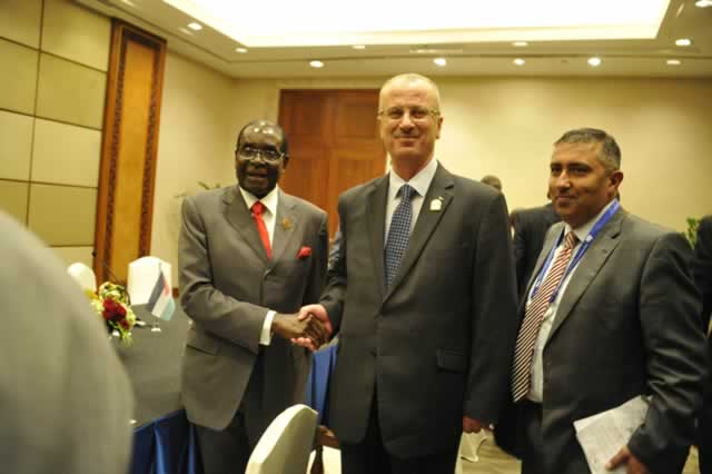 President Mugabe meets Palestinian President Mahmoud Abbas's representatie at the Jakarta Convention Centre this morning