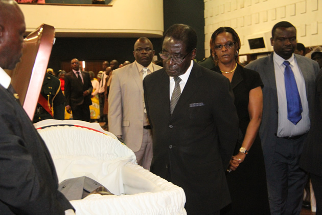 President Mugabe pays his last respects to the Cde Enos Nkala at Stodart Hall in Mbare
