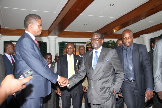 President Mugabe speaks to his Zambian counterpart Edgar Lungu at State House in Harare today.-(Picture by Tawanda Mudimu) 