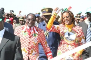 President Mugabe and the First Lady Amai Grace Mugabe greet Zanu-PF supporters.