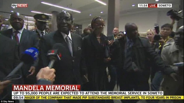 President Mugabe arrives at FNB stadium in Soweto, South Africa this morning-Daily Mail