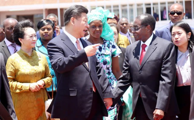 President Mugabe chats with his Chinese counterpart President Xi Jinping at Harare International Airport before the latter’s departure for South Africa recently. With them are the First Ladies, Amai Grace Mugabe and Madame Peng Liyuan (left). - (Picture by Believe Nyakudjara)