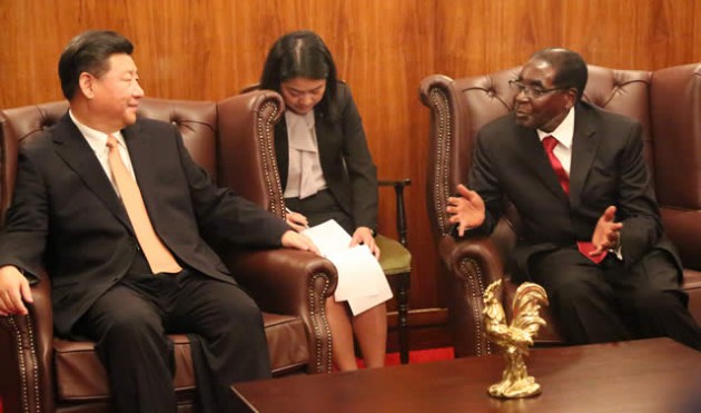President Mugabe talks to his Chinese counterpart President Xi Jinping during a media briefing at Harare International Airport before the latter’s departure for South Africa recently