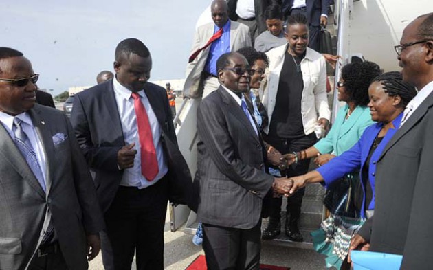 President Mugabe and First Lady Amai Grace Mugabe are welcomed by Ambassador to the UN Mr Frederick Shava (left) and embassy staff on arrival at JFK International Airport for the 71st Session of the United Nations General Assembly. — (Picture by Presidential photographer Joseph Nyadzayo)