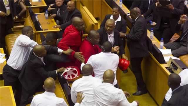 Members of South Africa’s Economic Freedom Fighters were kicked out of parliament for disrupting president Jacob Zuma’s state of the nation address