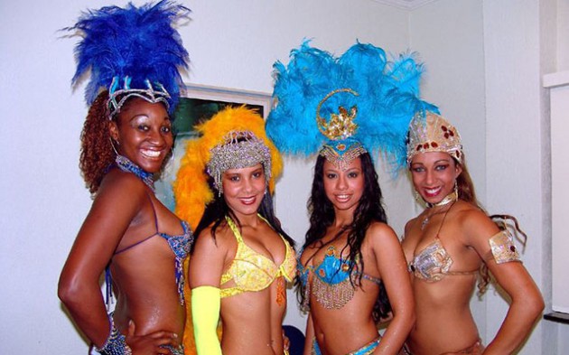 Samba dancers pose for a photo