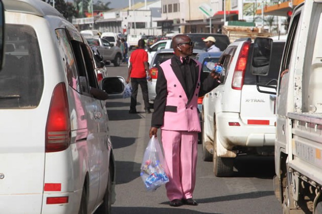 FARAI MUSHAYADEMO . . . “I decided that the best place to wear my suits was in the streets where I am the only vendor wearing such. I always stand out in a positive way and this is good for my business.” 