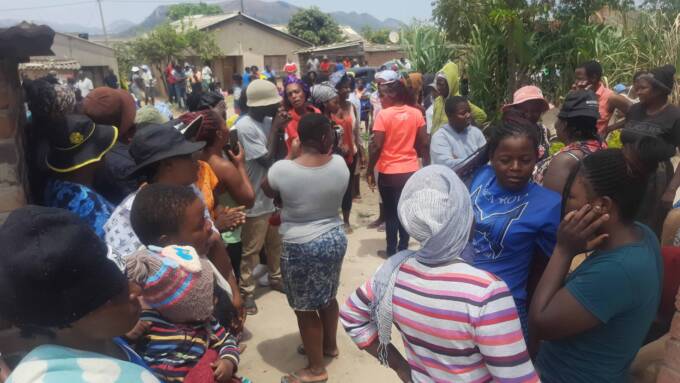Scores of onlookers gathered at the scene