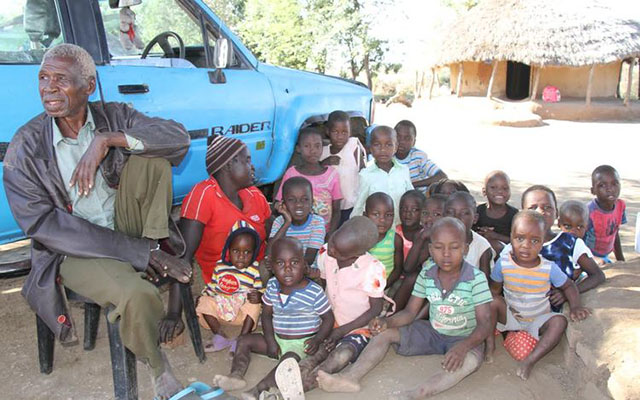 Sekuru Tauzeni Mujaji photographed with some of his children and wives at his homestead in Chipinge recently