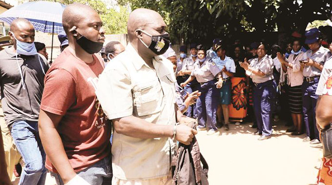Killer cop almost attacked at funeral